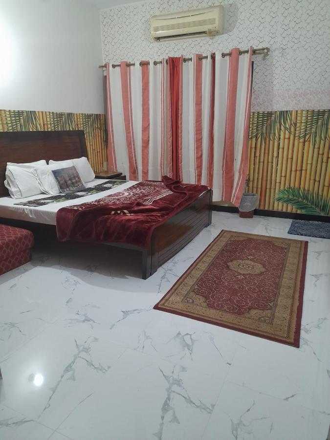 New City Lodges Guesthouse Islamabad Habitación foto